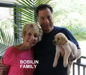 The Bobilin family and their new dog
