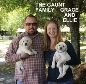 The Gaunt family and their puppies