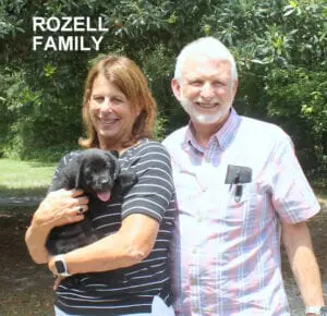 The Rozell family and their puppy